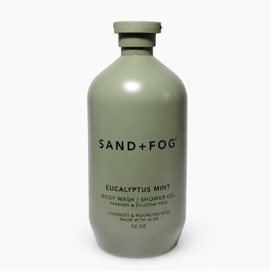 Sand + Fog Eucalyptus Mint body wash bottle on an off-white background
